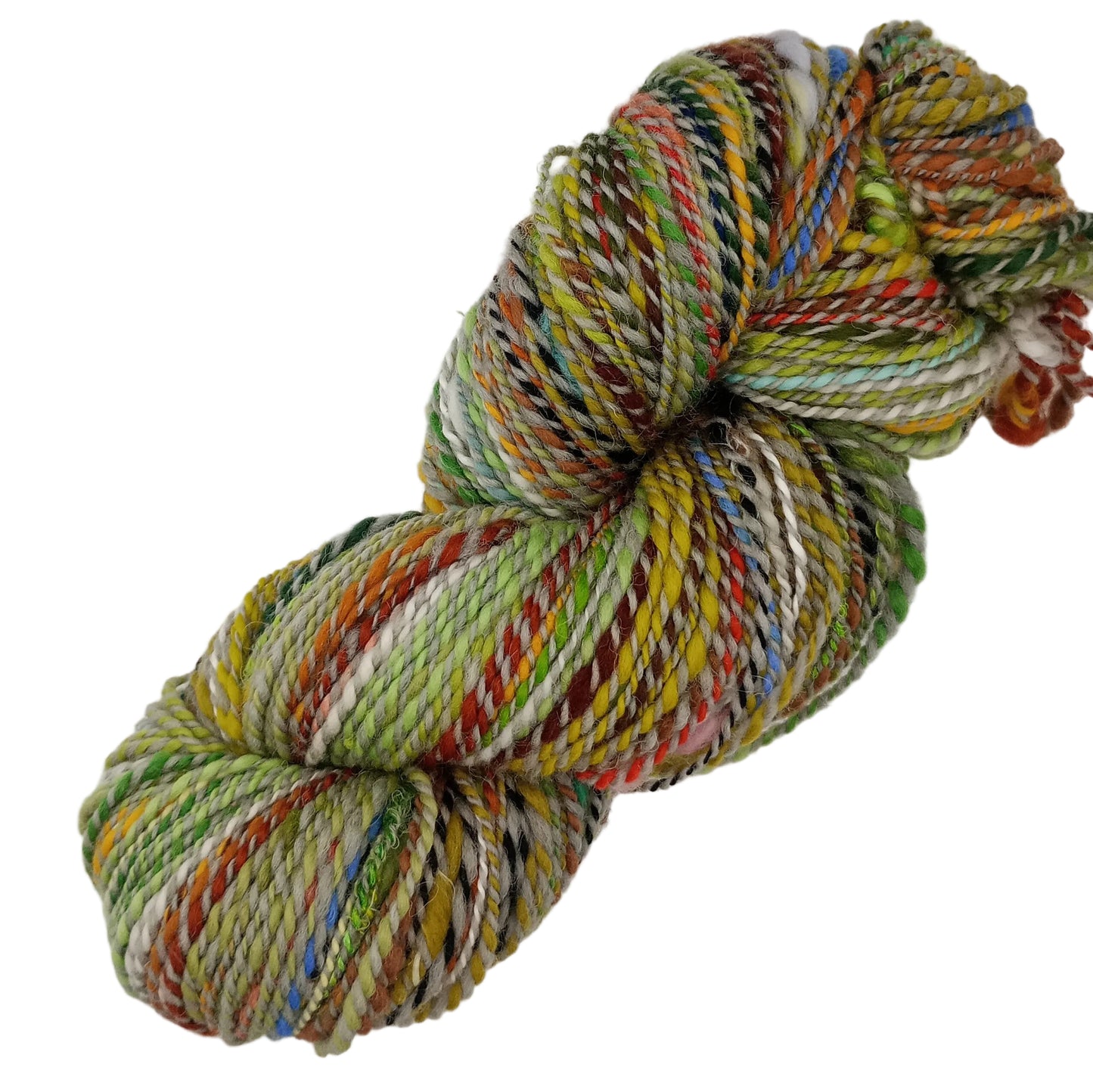 A skein of variegated yarn with mixed colors including green, yellow, orange, red, blue, and white, photographed on a plain white background.