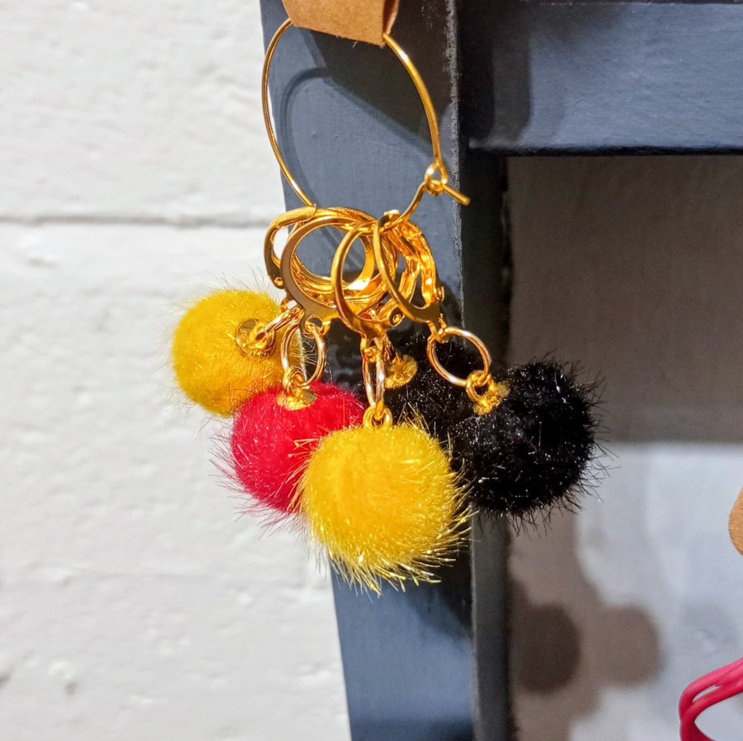 Pompom stitch markers black yellow and red